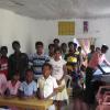 Students inside their new classroom at a dedication ceremony.