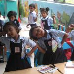 The school is a cheerful and lively place, full of sounds of laughter and learning.